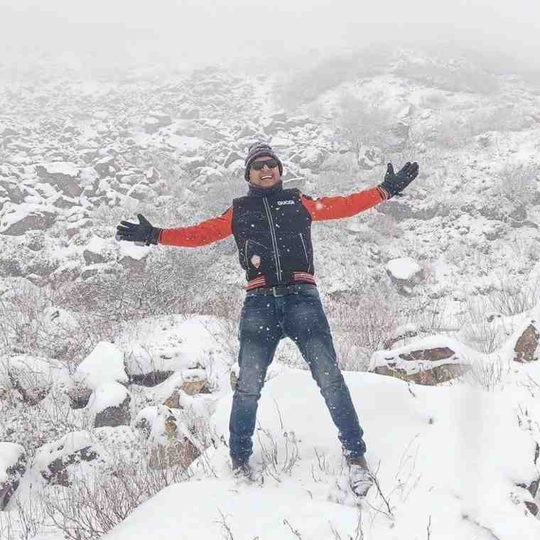 Professional portrait of a news presenter and banker